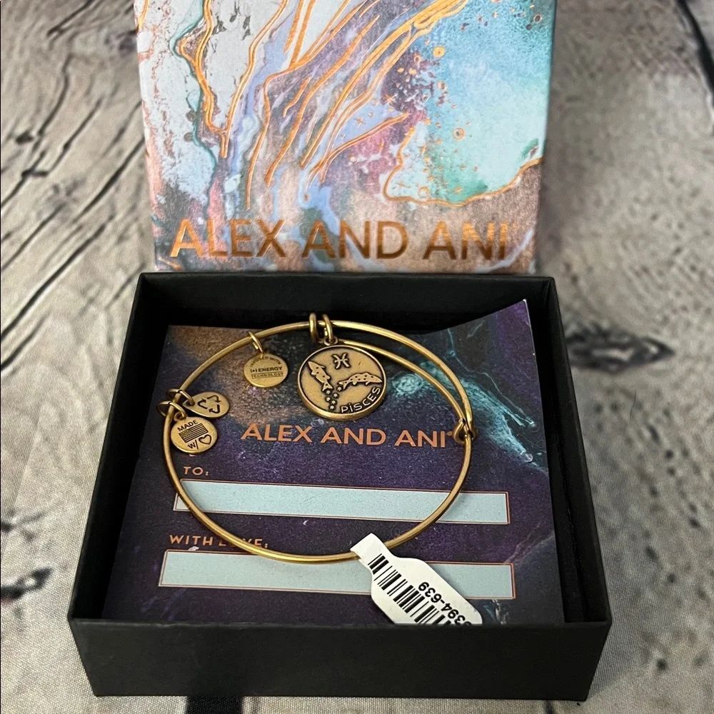 * Alex and Ani Gold Bangle with Charms